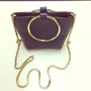NWOT! Co lab Montreal mini bag in Navy with gold.